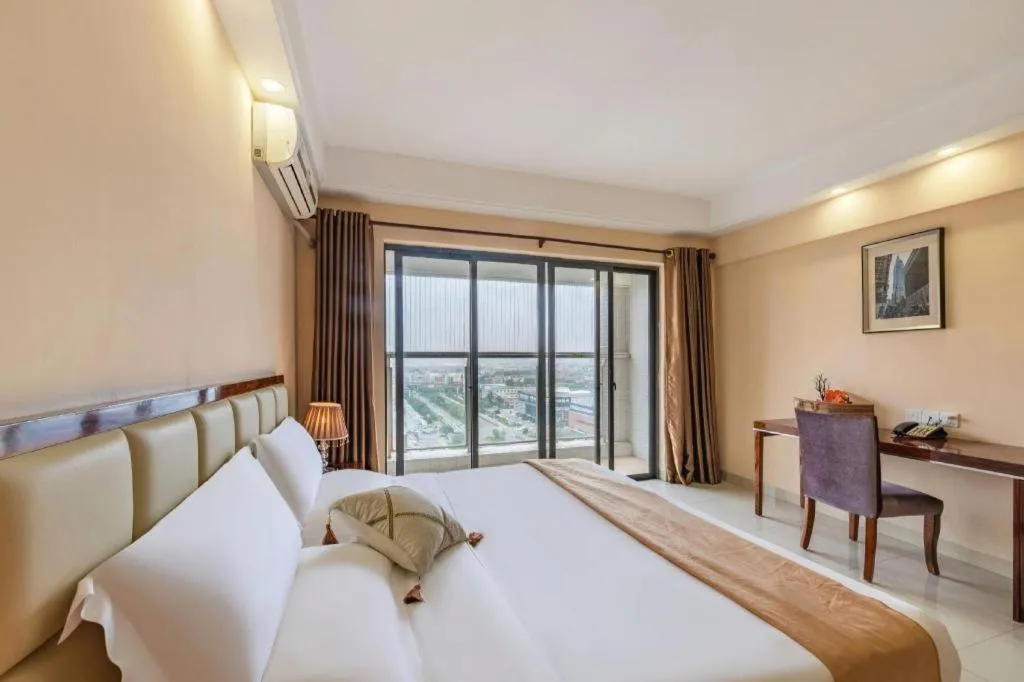 Bed in Foshan Baolong Hotel