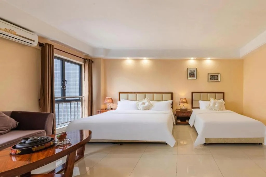 Bed in Foshan Baolong Hotel