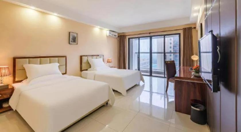 Bed in Foshan Baolong Hotel