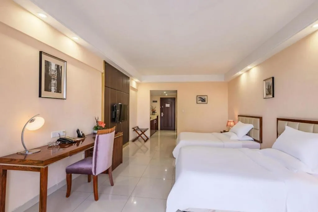 Bed in Foshan Baolong Hotel