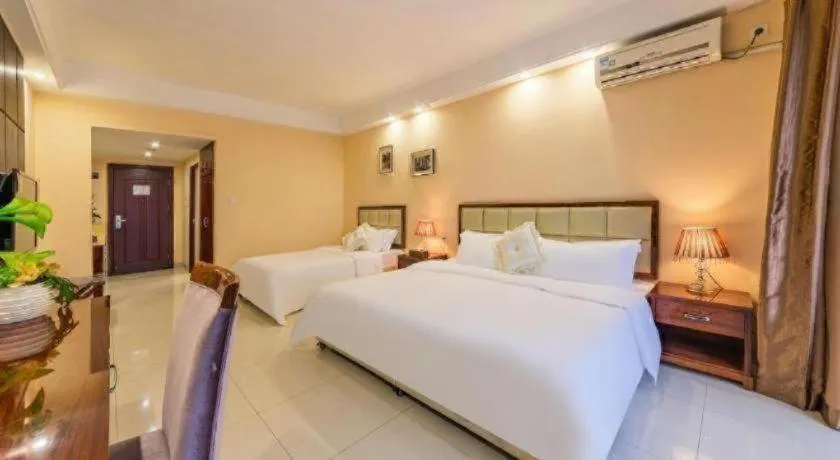 Bed in Foshan Baolong Hotel