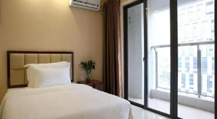 Bed in Foshan Baolong Hotel