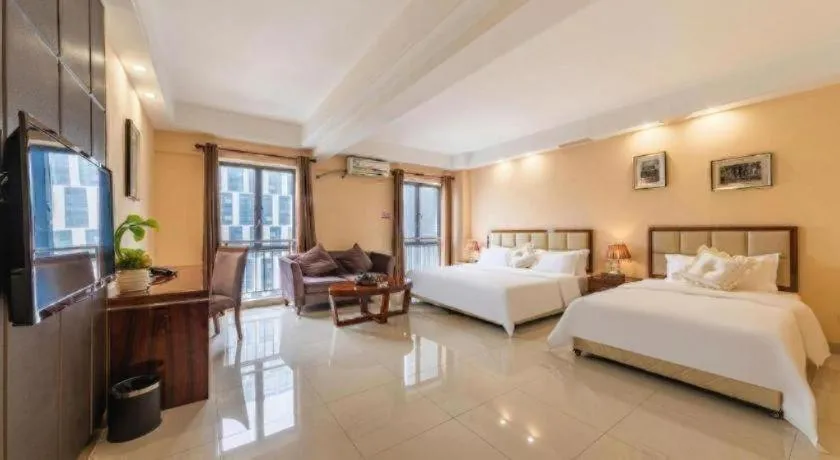 Bed in Foshan Baolong Hotel