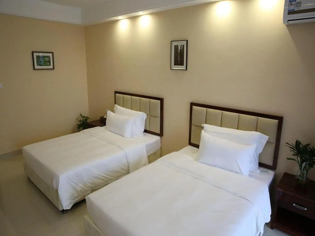 Bed in Foshan Baolong Hotel