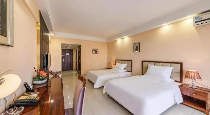 Bed in Foshan Baolong Hotel