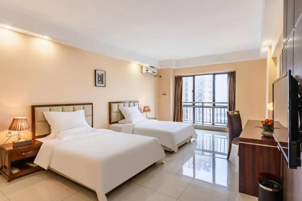 Bed in Foshan Baolong Hotel