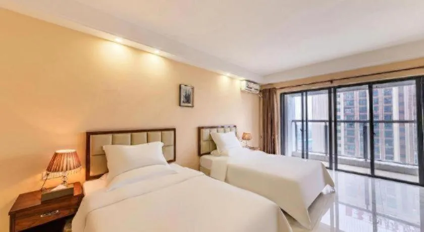 Bed in Foshan Baolong Hotel
