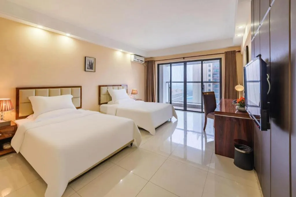 Bed in Foshan Baolong Hotel