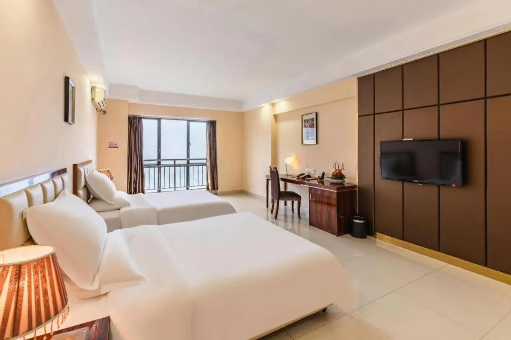 Bed in Foshan Baolong Hotel