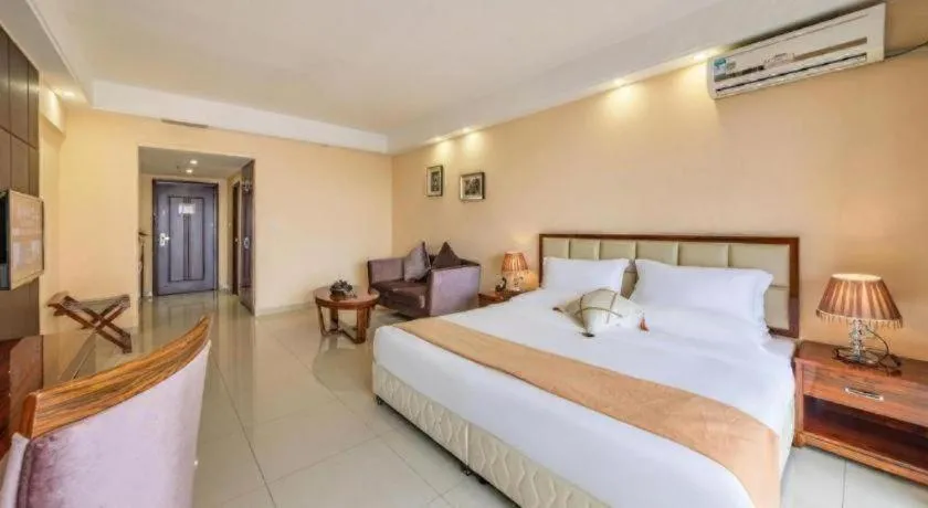 Bed in Foshan Baolong Hotel