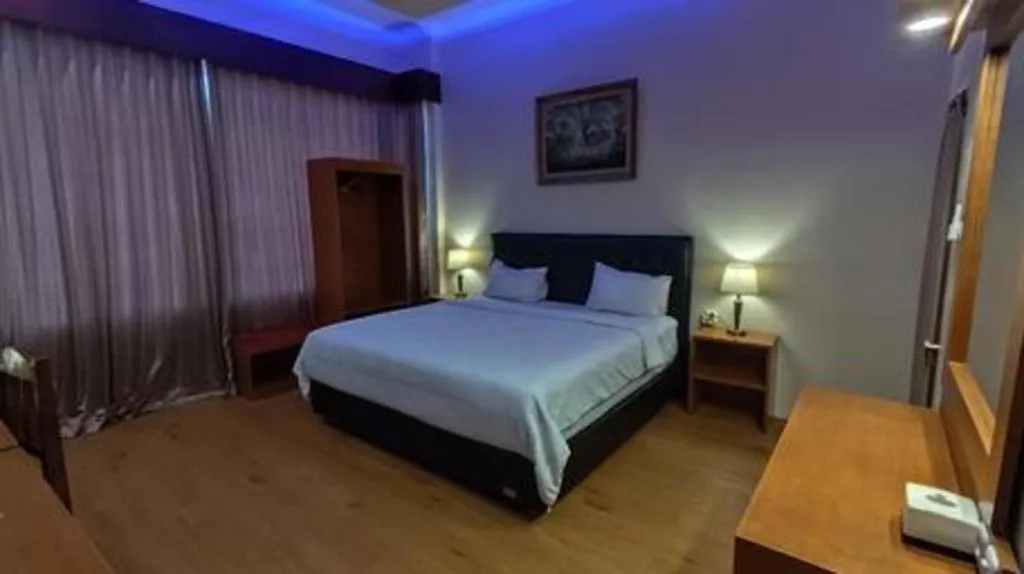 Bed in Parai Beach Resort Telengria