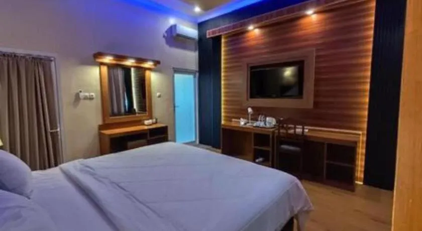 Bed in Parai Beach Resort Telengria