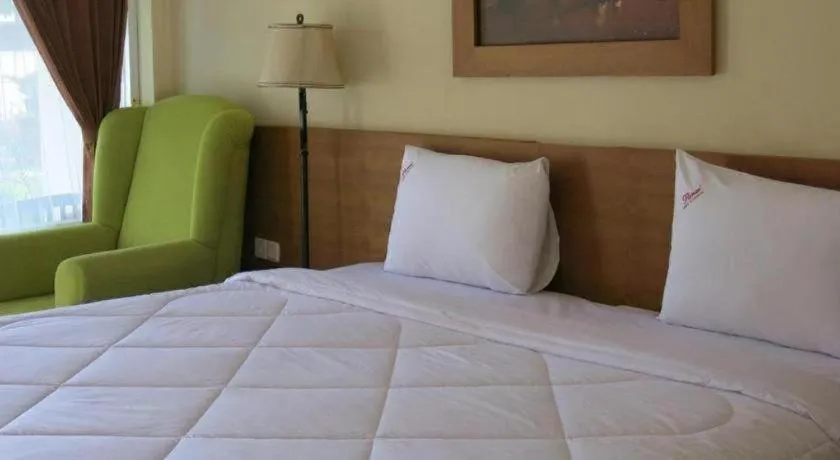 Bed in Parai Beach Resort Telengria