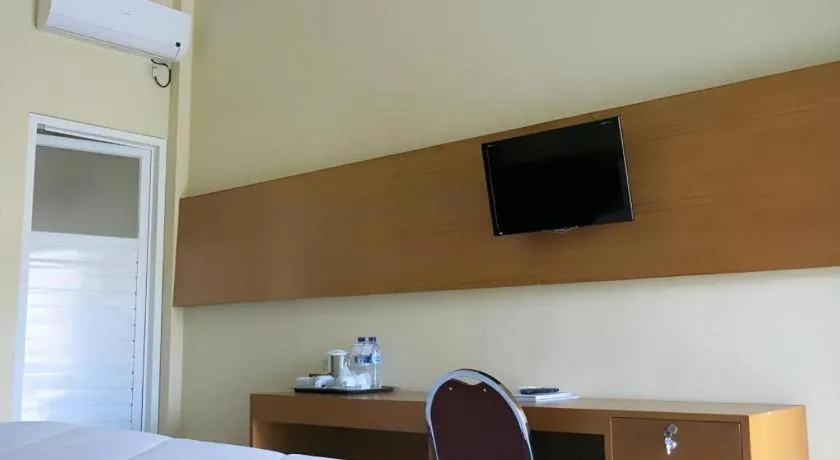 Bed in Parai Beach Resort Telengria