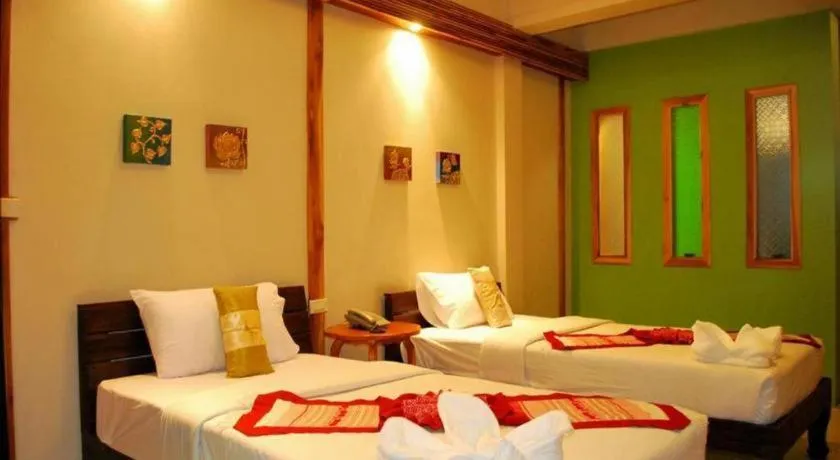 Bed in Oopkaew Resort