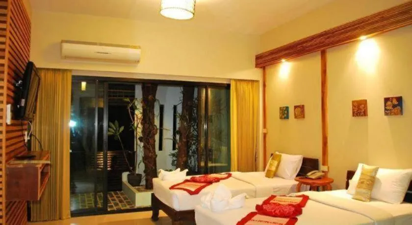 Bed in Oopkaew Resort