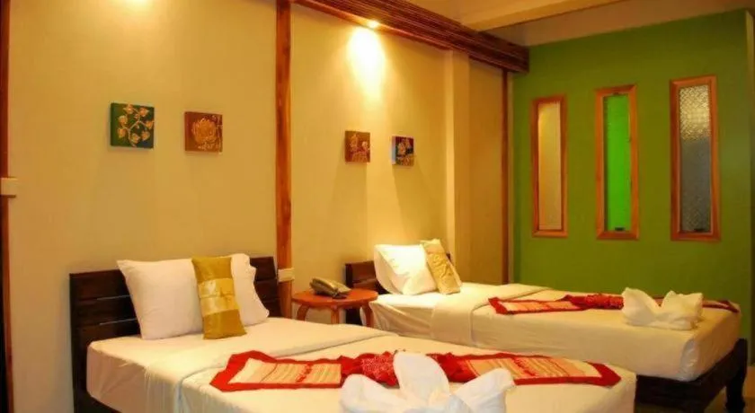 Bed in Oopkaew Resort