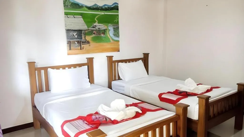 Bed in Oopkaew Resort