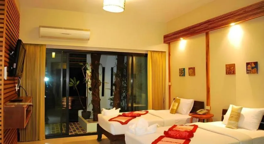 Bed in Oopkaew Resort