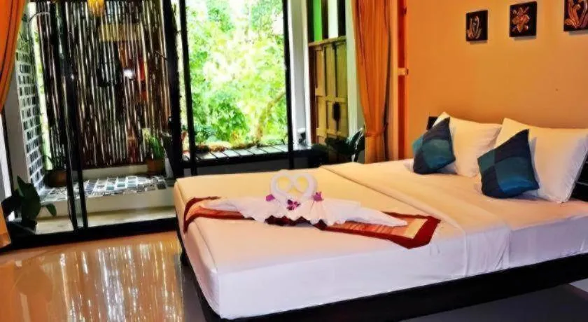 Bed in Oopkaew Resort