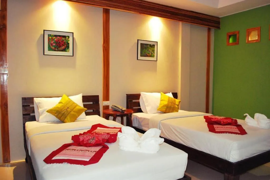 Bed in Oopkaew Resort