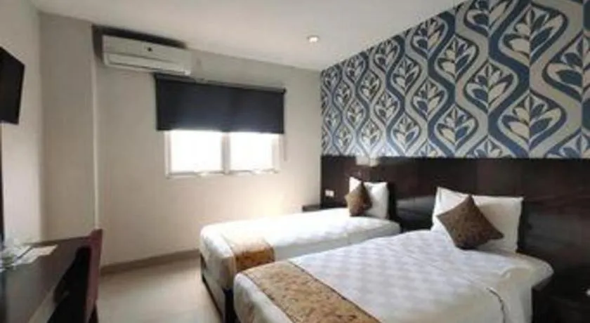 Bed in Jelita Bandara Hotel Airport