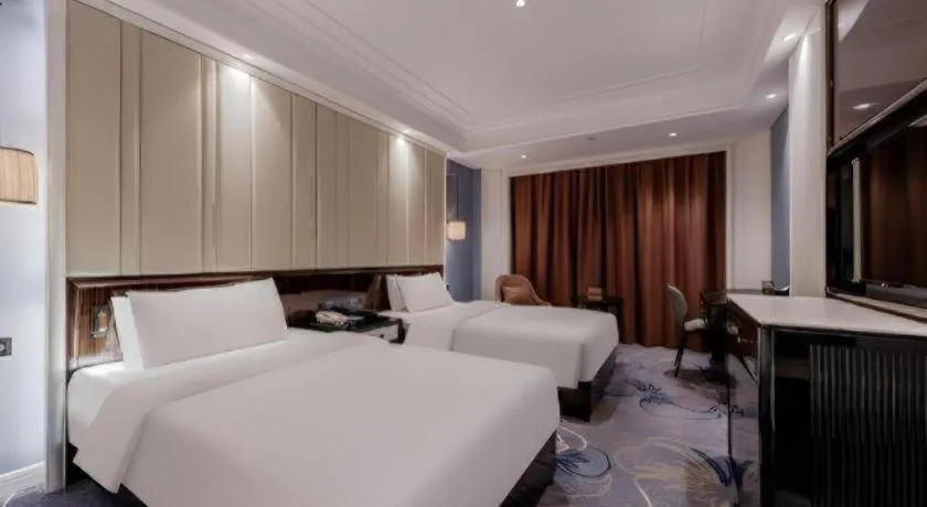 Bed in Jinjiang Metropolo Hotel Nanjing Confucius Temple Branch