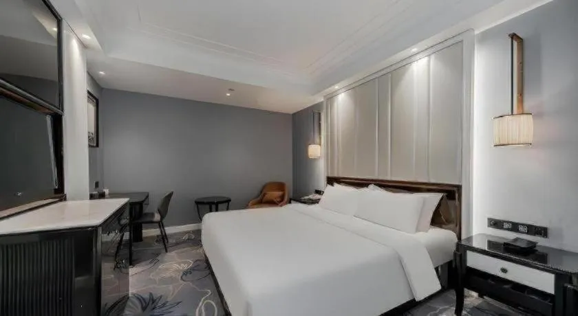 Bed in Jinjiang Metropolo Hotel Nanjing Confucius Temple Branch