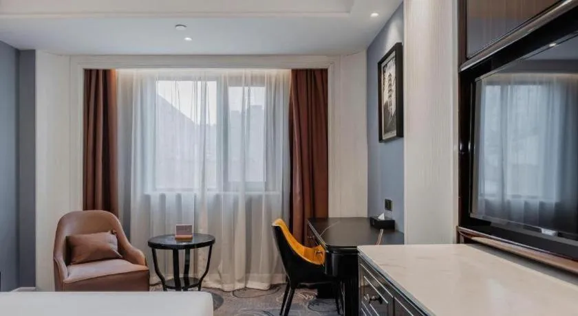 Bed in Jinjiang Metropolo Hotel Nanjing Confucius Temple Branch