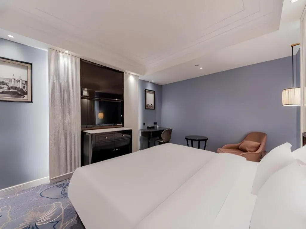 Bed in Jinjiang Metropolo Hotel Nanjing Confucius Temple Branch