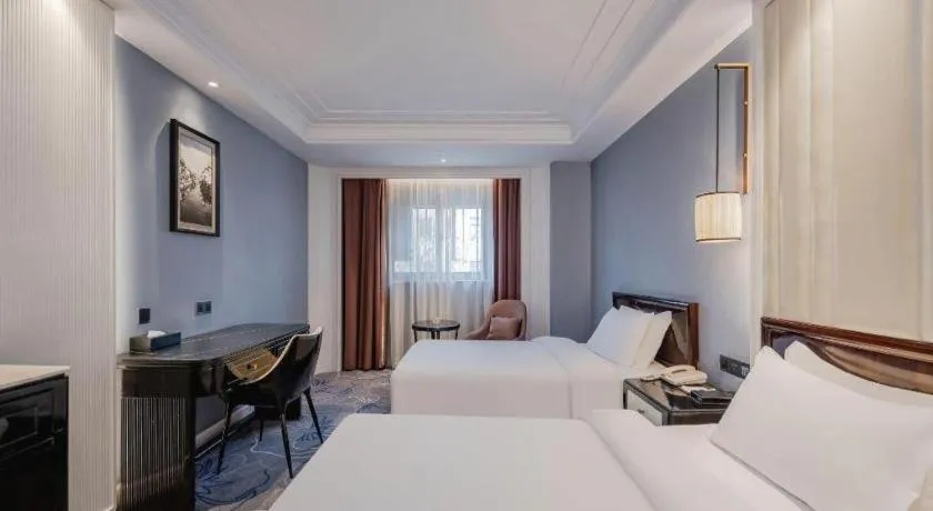 Bed in Jinjiang Metropolo Hotel Nanjing Confucius Temple Branch