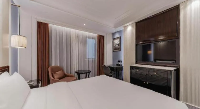 Bed in Jinjiang Metropolo Hotel Nanjing Confucius Temple Branch