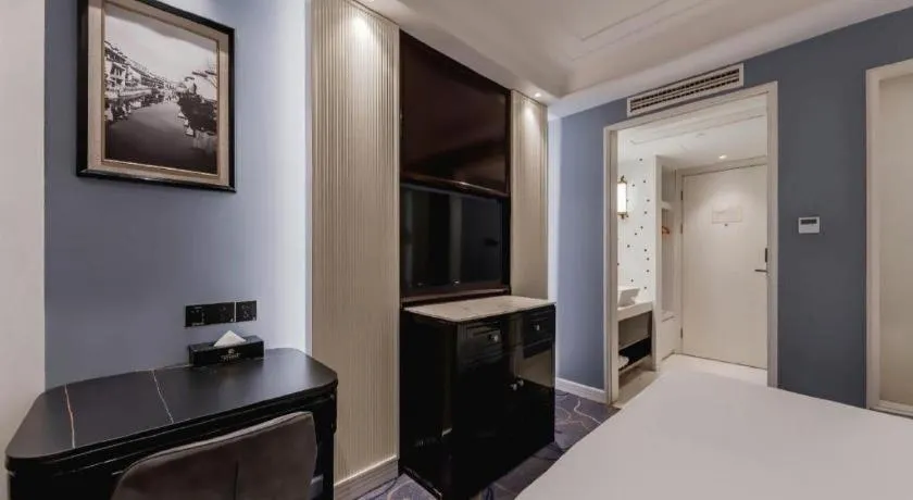 Bed in Jinjiang Metropolo Hotel Nanjing Confucius Temple Branch