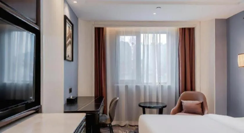 Bed in Jinjiang Metropolo Hotel Nanjing Confucius Temple Branch