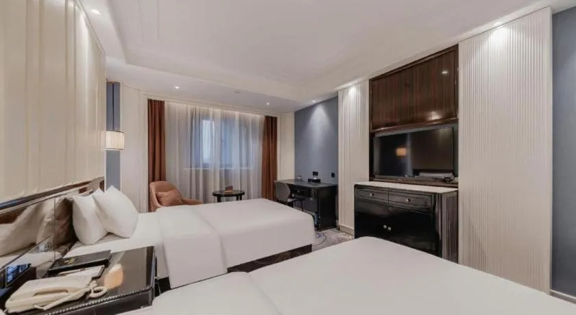 Bed in Jinjiang Metropolo Hotel Nanjing Confucius Temple Branch