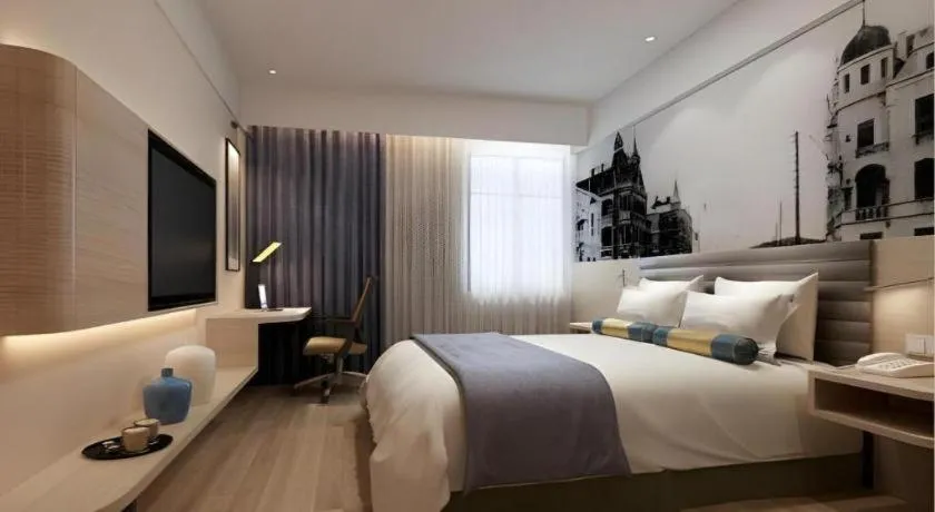 Bed in Jinjiang Metropolo Hotel Nanjing Confucius Temple Branch