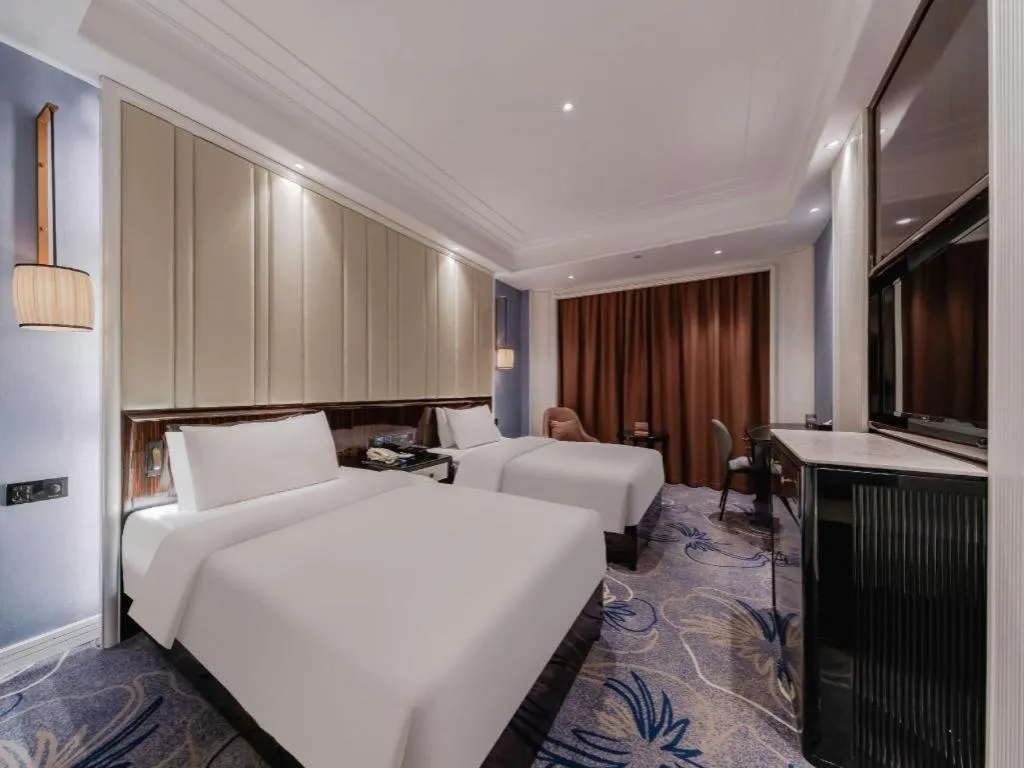 Bed in Jinjiang Metropolo Hotel Nanjing Confucius Temple Branch