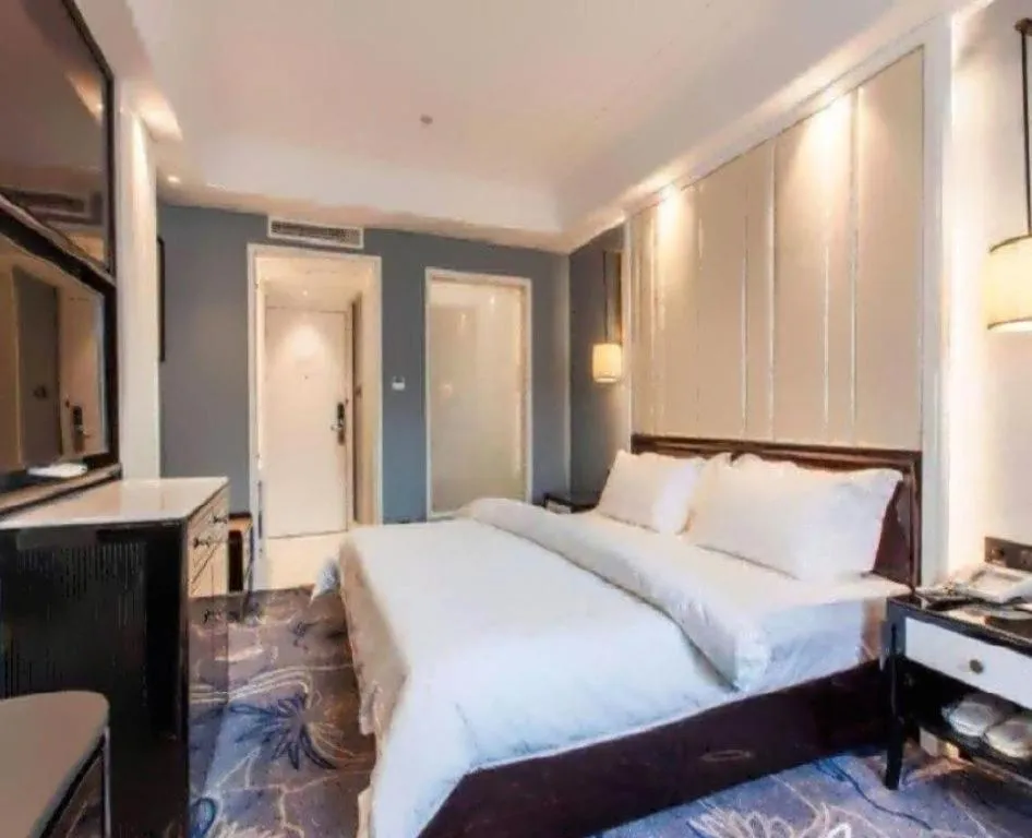 Bed in Jinjiang Metropolo Hotel Nanjing Confucius Temple Branch