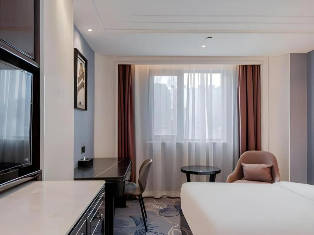 Bed in Jinjiang Metropolo Hotel Nanjing Confucius Temple Branch