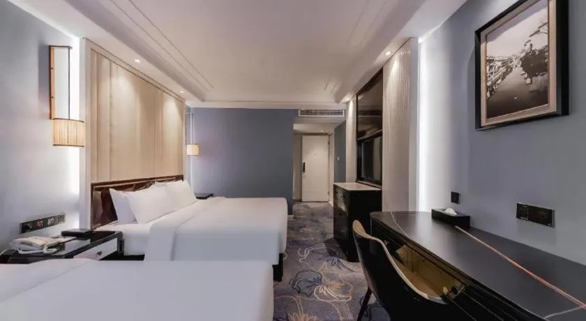 Bed in Jinjiang Metropolo Hotel Nanjing Confucius Temple Branch