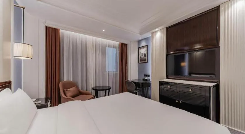 Bed in Jinjiang Metropolo Hotel Nanjing Confucius Temple Branch