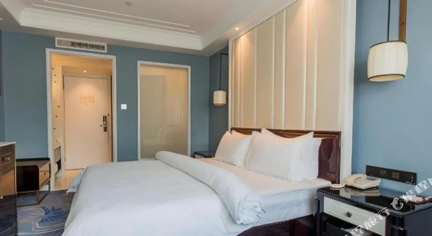 Bed in Jinjiang Metropolo Hotel Nanjing Confucius Temple Branch