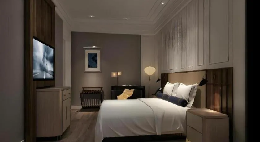 Bed in Jinjiang Metropolo Hotel Nanjing Confucius Temple Branch