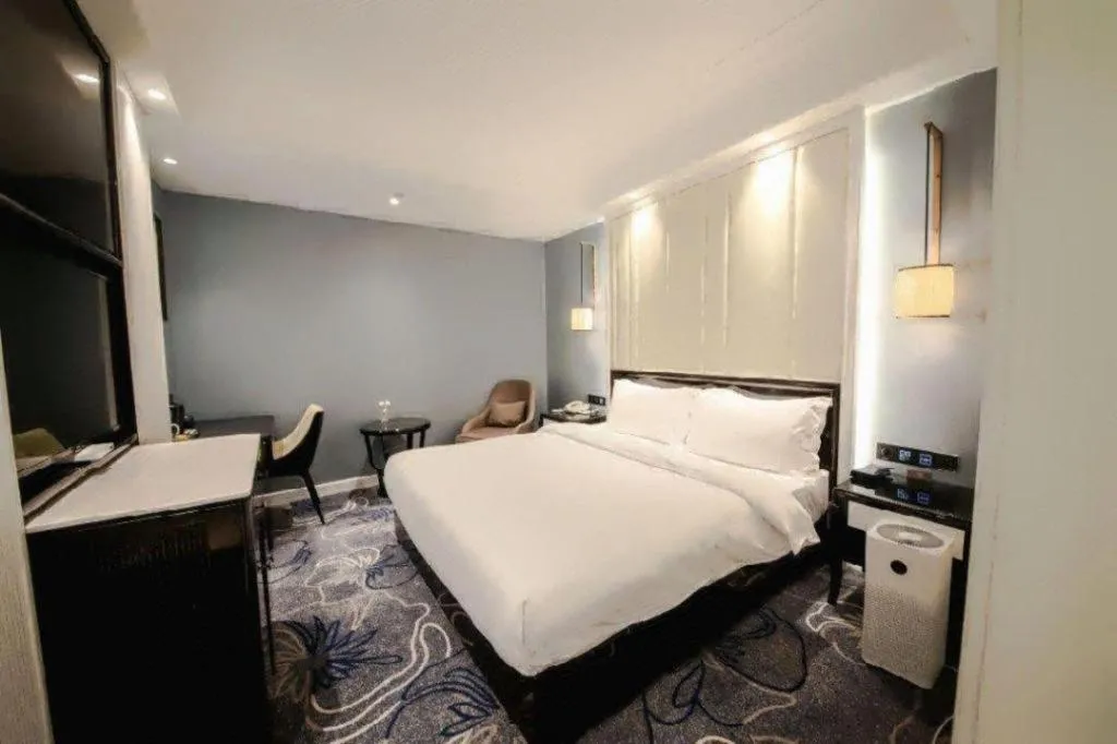 Bed in Jinjiang Metropolo Hotel Nanjing Confucius Temple Branch