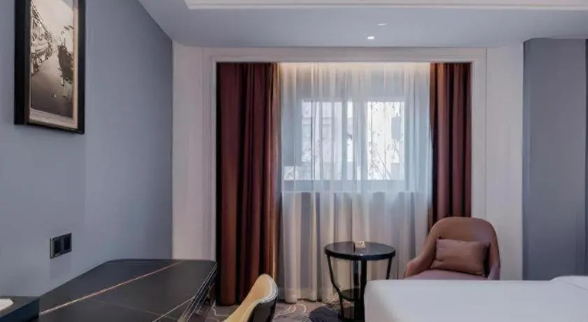 Bed in Jinjiang Metropolo Hotel Nanjing Confucius Temple Branch