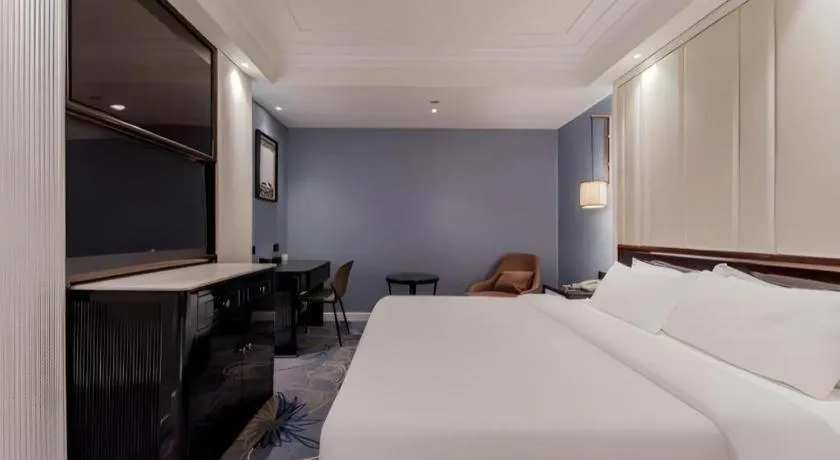 Bed in Jinjiang Metropolo Hotel Nanjing Confucius Temple Branch