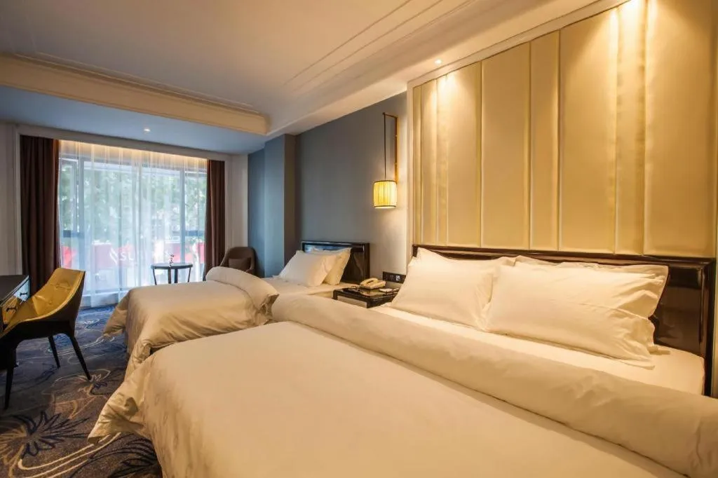 Bed in Jinjiang Metropolo Hotel Nanjing Confucius Temple Branch