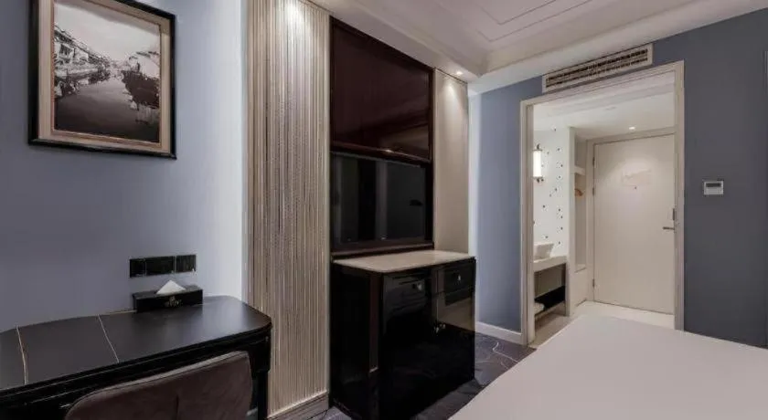 Bed in Jinjiang Metropolo Hotel Nanjing Confucius Temple Branch