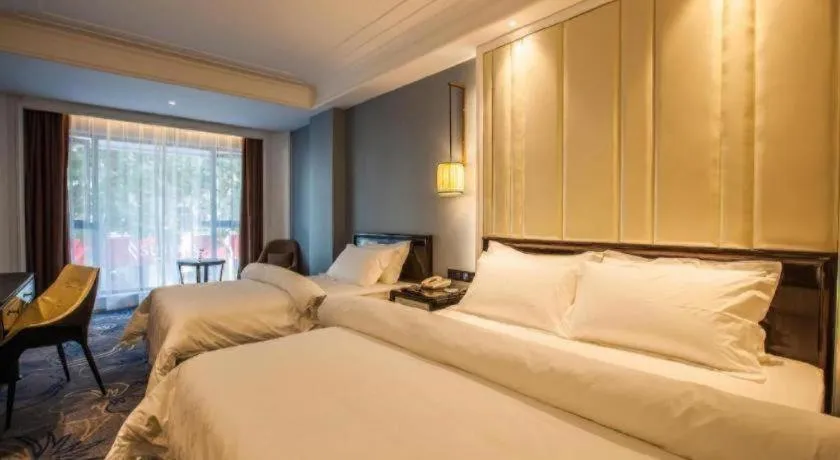 Bed in Jinjiang Metropolo Hotel Nanjing Confucius Temple Branch