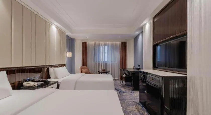 Bed in Jinjiang Metropolo Hotel Nanjing Confucius Temple Branch